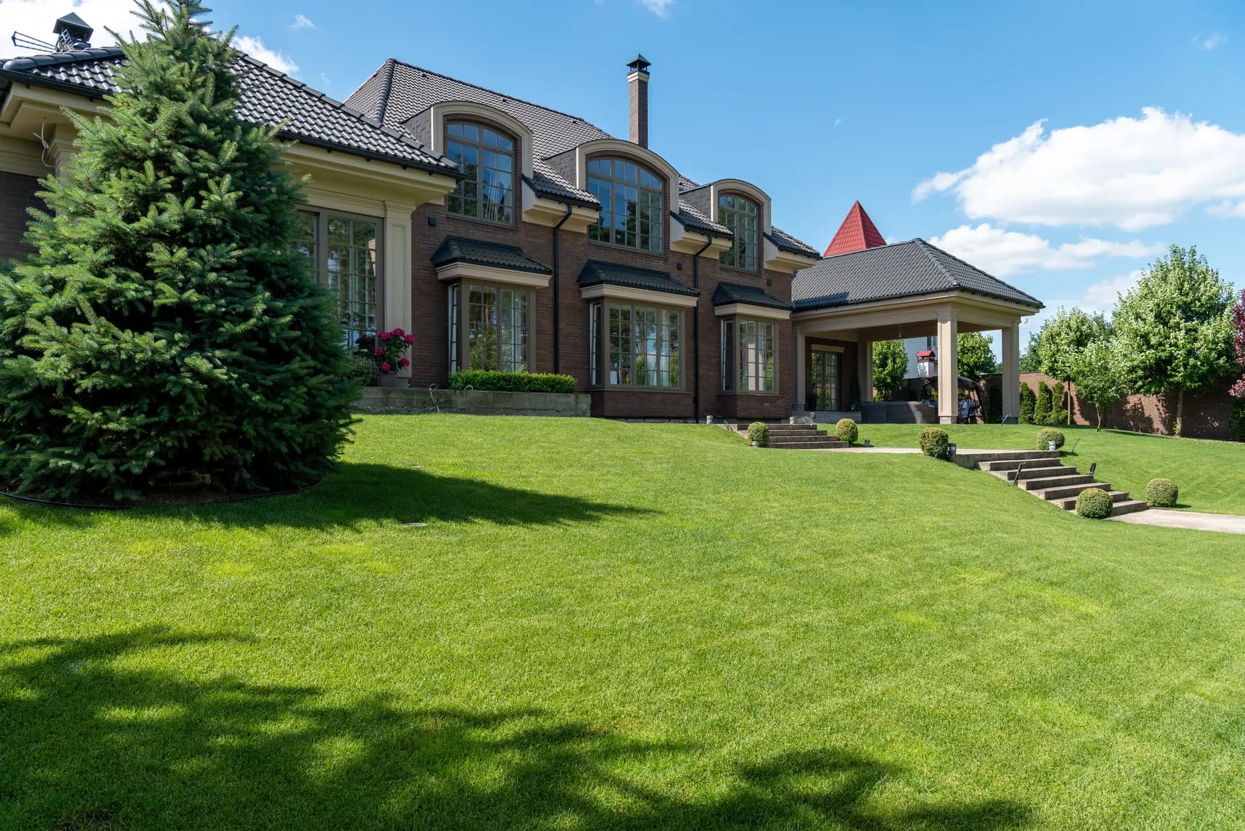 Exterior of a brick-faced luxury family home